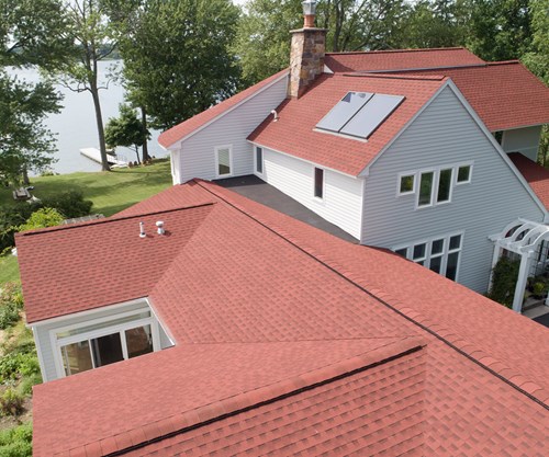 roofing contractors near syracuse ny image of roofs with gaf shingles and solar panel from van derhoof