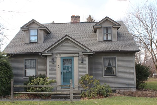 roof leak repair near syracuse ny image of house with gray roof from van derhoof